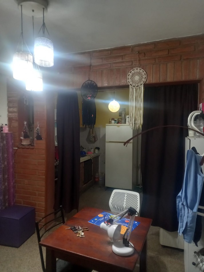 BARRIO SAN ROQUE, CASA A METROS DE RUTA 20 DE DOS PISOS.