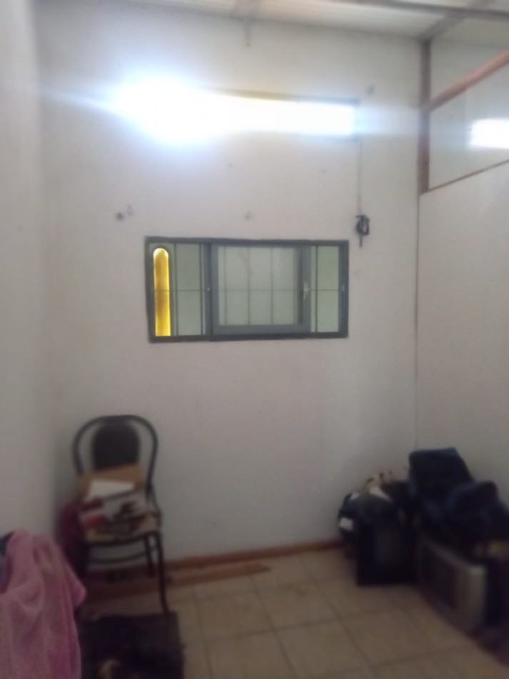 BARRIO SAN ROQUE, CASA A METROS DE RUTA 20 DE DOS PISOS.